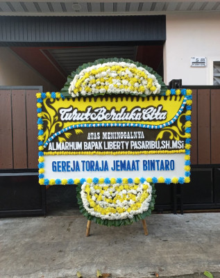 Papan Bunga Duka di Seluas